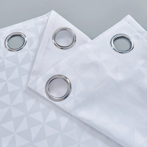 White modern outdoor curtains with grey geometric patterns and silver grommets