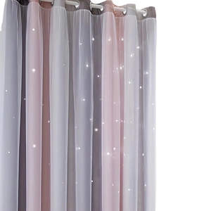 Rainbow gradient blackout curtains with hollow stars and white sheer overlay for kids