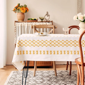 Bohemian style beige cotton linen tablecloth with yellow embroidery and tassel details