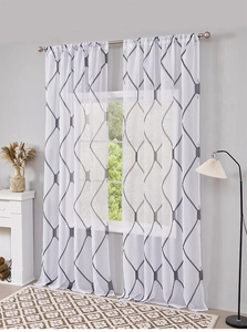 Close-up of semi-transparent white and grey geometric diamond lattice sheer curtains