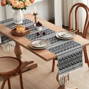 Bohemian black and white geometric woven table runner with white tassels for coffee tables