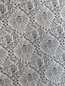 Detailed close-up showing the intricate mesh texture and floral lace pattern of the curtain