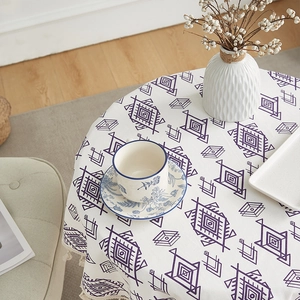 Bohemian round tablecloth with purple geometric patterns and elegant tassel edge decor