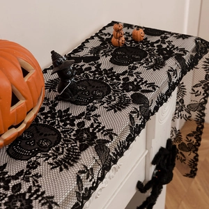 Halloween black lace fireplace mantel scarf featuring skull and spiderweb patterns