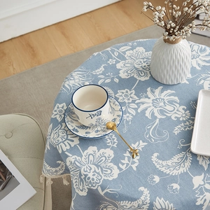 Blue and white floral cotton linen tablecloth with elegant white fringe tassel edges