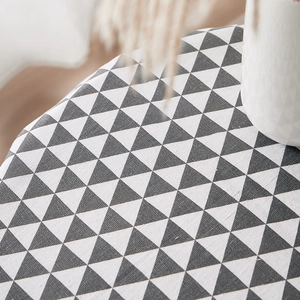 Nordic cotton linen tablecloth with black geometric triangle patterns and decorative tassels