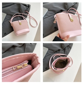 Détails du sac seau rose montrant la doublure intérieure, les ferrures dorées et texture