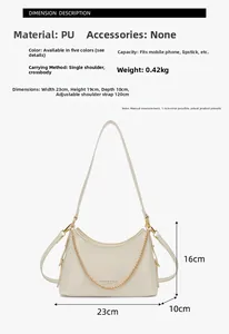 Detail view of cream PU leather bucket bag with dimensions 23x19x10cm and gold chain strap