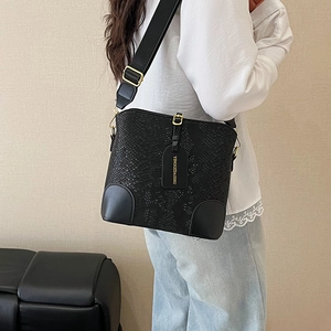 Fashionable black faux snakeskin bucket bag with wide shoulder strap for women