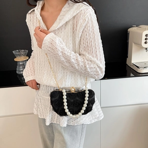 Elegant black evening bag with 3D chiffon roses, pearl handle and gold chain strap