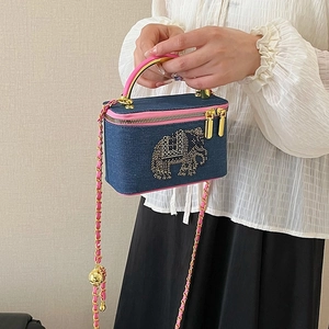 Mini denim box bag with pink leather trim and sparkling elephant rhinestone motif