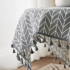 Gray arrow pattern cotton linen tablecloth with elegant tassels in a Nordic minimalist style