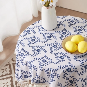 Floral cotton linen round tablecloth with blue vine patterns and fringe tassel edges