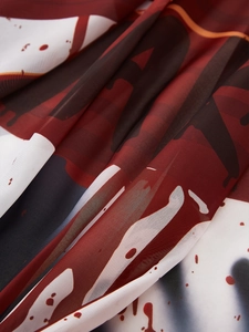 Detail of Halloween door curtain showing blood splatter print on semi-transparent fabric