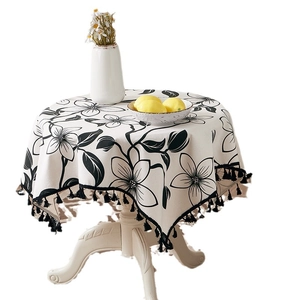 Modern cotton linen round tablecloth with floral pattern and black tassel fringe
