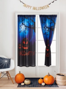 Detail of translucent Halloween door curtain with pumpkins, bats and red text