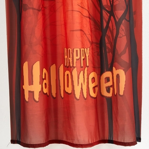 Red translucent Happy Halloween door curtain with black tree silhouettes for festive decor