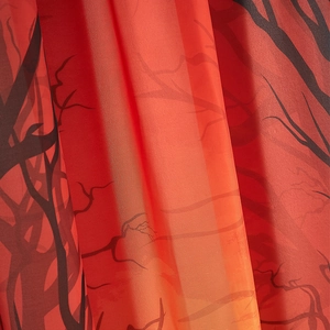 Red gradient Halloween curtain featuring dark forest tree branch patterns for festive decor