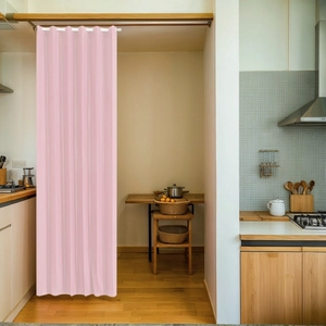 Detail of pink pleated partition curtain fabric with vertical texture and white rings