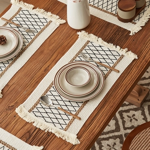 Cotton linen table runner with geometric diamond pattern and decorative fringe tassels