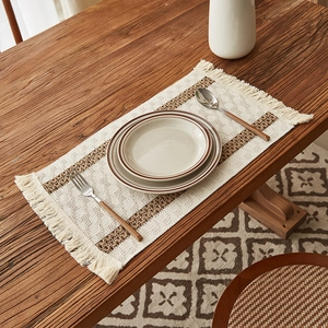Minimalist beige cotton linen table runner with brown stripes and decorative tassels