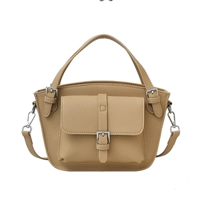 Retro light brown bucket bag with lychee grain leather and silver pin buckle details