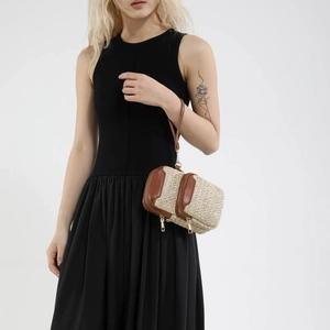 Straw woven mini crossbody bag for women with dual zippers and brown wrist strap