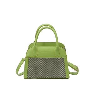 Green leather handbag with grey herringbone weave and detachable shoulder strap