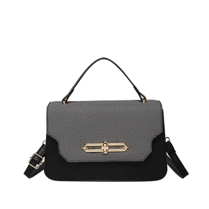 Elegant two-tone grey and black leather handbag with a gold metal ring buckle