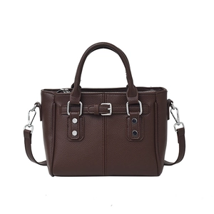 Dark brown textured leather tote bag with silver studs and detachable shoulder strap