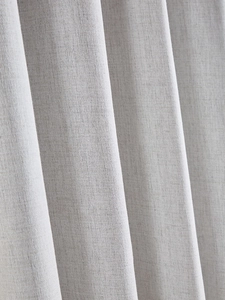 Detailed macro shot of thick gray linen curtain fabric texture with elegant natural folds