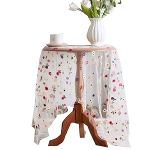 White lace tablecloth with floral embroidery in pastoral style for dining table decor