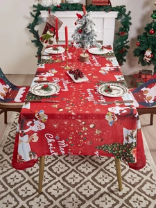 Detailed view of red Christmas tablecloth and chair covers with festive Santa patterns