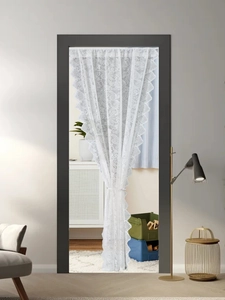 Detailed white lace door curtain with floral embroidery and elegant scalloped edge design
