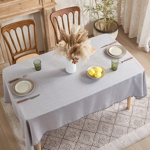Modern light gray linen tablecloth with fringe edges for rectangular dining tables