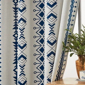 Detail of bohemian geometric pattern on beige linen blackout curtain with blue diamond prints