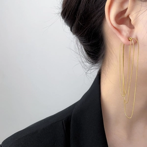 Minimalist gold snake chain fringe earrings featuring multi-layer tassel drop design