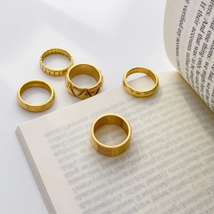 5-piece 18K gold plated stainless steel ring set with textured geometric patterns