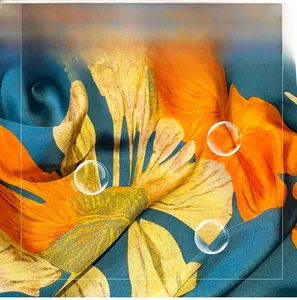 Close-up of silky ginkgo leaf print fabric showing breathable and smooth texture
