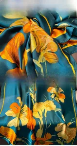Detail view of floral silk shawl featuring eco-friendly dyeing and precise edge stitching