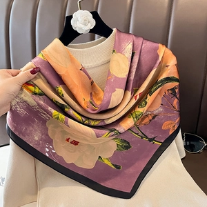 Elegant purple silk-like floral square scarf with vibrant print and smooth texture