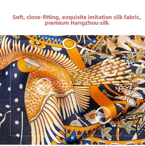 Detailed macro view of soft silk-like fabric with bird and star prints in deep blue