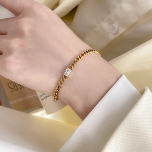 18K gold plated titanium chain bracelet featuring a rectangular zircon on female wrist