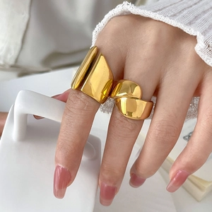Polished gold wide geometric stackable chunky rings with minimalist dome aesthetic