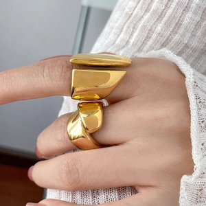 Minimalist chunky gold dome ring set in a bold geometric sculptural design for women