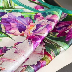 Oil painting style silk scarf featuring purple iris flowers and green leaf patterns