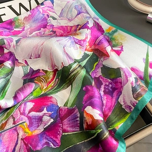 Luxurious oil painting silk scarf featuring vibrant purple irises with green borders