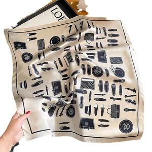 Elegant champagne silk square scarf with hand-painted black fashion element prints