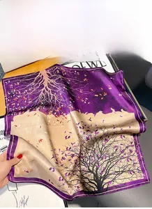 Detail of purple and champagne silk scarf featuring vintage floral branch prints