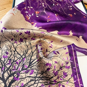 Elegant purple and champagne silk scarf featuring artistic branch and leaf patterns